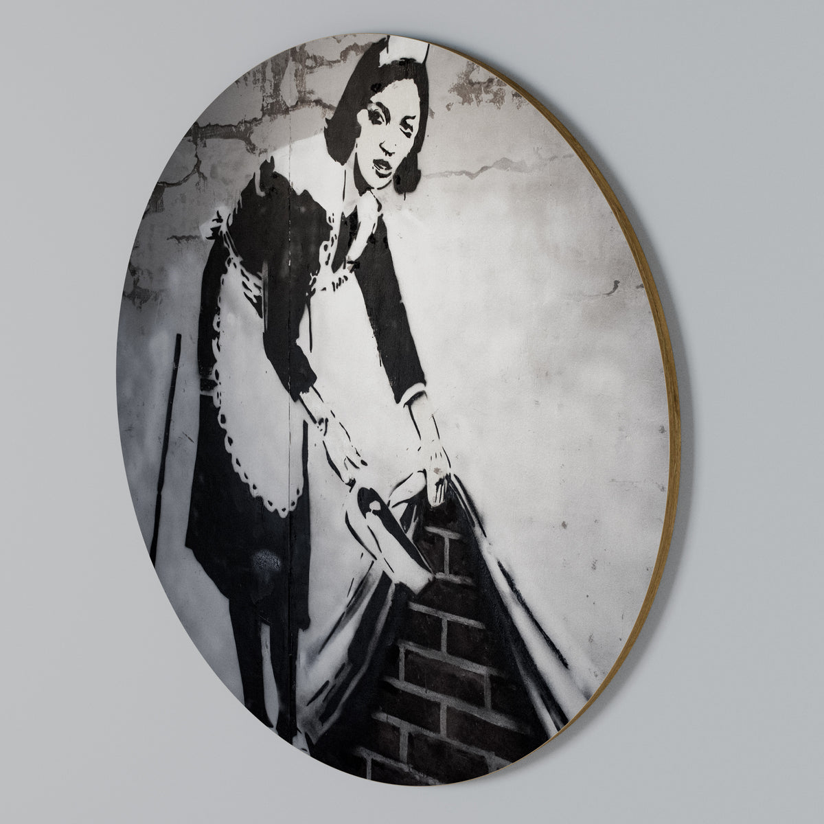SWEEPING UNDER (BANKSY) Kulatá nástěnná dekorace