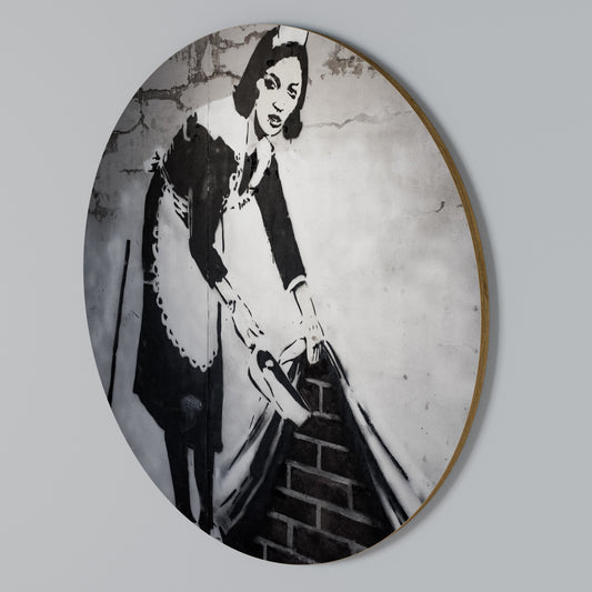 SWEEPING UNDER (BANKSY) Kulatá nástěnná dekorace